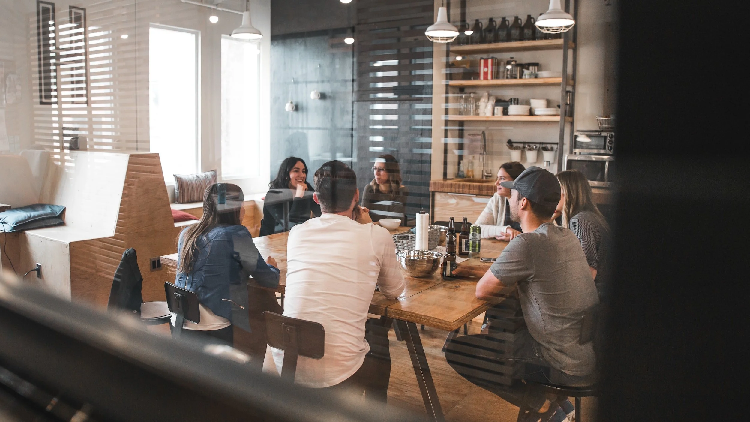 The Inkwell team meeting around a table